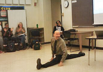 William Vicars, Ed.D. doing the splits in his American sign language class.